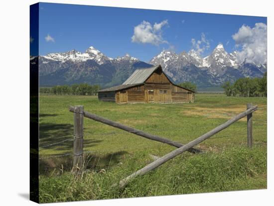 Moulton Barn on Mormon Row with the Grand Tetons Range, Grand Teton National Park, Wyoming, USA-Neale Clarke-Stretched Canvas