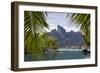 Mount Otemanu As Seen Through Palm Fronds At The Four Seasons Bora Bora. French Polynesia-Karine Aigner-Framed Photographic Print