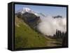 Mount Rainier rises above a fog bank, Tatoosh Wilderness, Washington State, USA-Janis Miglavs-Framed Stretched Canvas