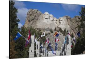 Mount Rushmore National Memorial, Avenue of Flags, South Dakota, USA-Walter Bibikow-Stretched Canvas