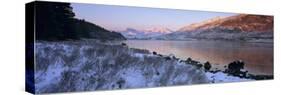 Mount Snowdon in snow at sunrise with frozen LLynnau Mymbyr lake, Capel Curig, Snowdonia-Stuart Black-Stretched Canvas