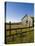 Mountain bike and barn on Birch Hill, New Durham, New Hampshire, USA-Jerry & Marcy Monkman-Stretched Canvas