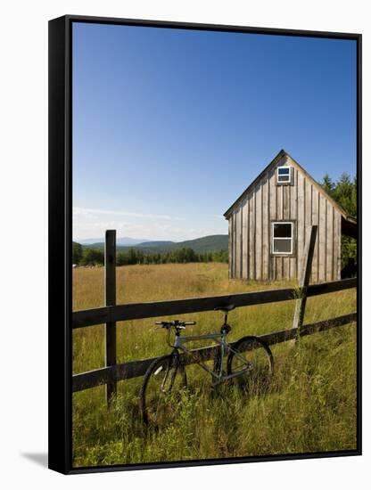 Mountain bike and barn on Birch Hill, New Durham, New Hampshire, USA-Jerry & Marcy Monkman-Framed Stretched Canvas