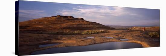 Mountain Bike Riders on a Trail, Slickrock Trail, Sand Flats Recreation Area, Moab, Utah, USA-null-Stretched Canvas