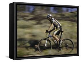 Mountain Biker Against a Blurry Background, Mt. Bike-Michael Brown-Framed Stretched Canvas