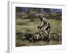 Mountain Biker Against a Blurry Background, Mt. Bike-Michael Brown-Framed Photographic Print