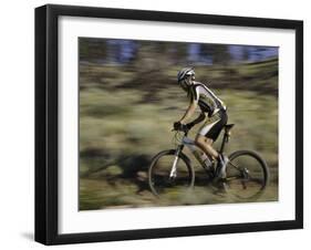 Mountain Biker Against a Blurry Background, Mt. Bike-Michael Brown-Framed Photographic Print