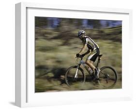 Mountain Biker Against a Blurry Background, Mt. Bike-Michael Brown-Framed Photographic Print