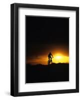 Mountain Biker Against Stormy Sunset, Fruita, Colorado, USA-Chuck Haney-Framed Premium Photographic Print