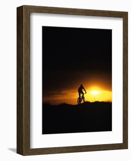 Mountain Biker Against Stormy Sunset, Fruita, Colorado, USA-Chuck Haney-Framed Photographic Print