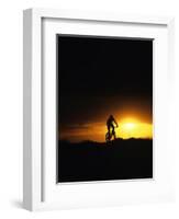 Mountain Biker Against Stormy Sunset, Fruita, Colorado, USA-Chuck Haney-Framed Photographic Print