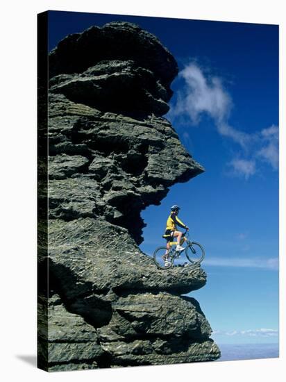 Mountain Biker and Rock Tor, Dunstan Mountains, Central Otago-David Wall-Stretched Canvas