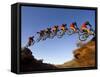 Mountain Biker Catches Air at Rampage Site near Virgin, Utah, USA-Chuck Haney-Framed Stretched Canvas