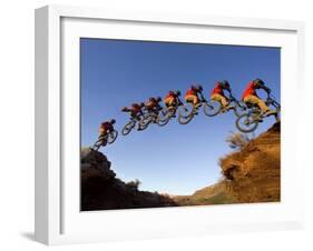 Mountain Biker Catches Air at Rampage Site near Virgin, Utah, USA-Chuck Haney-Framed Premium Photographic Print