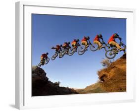 Mountain Biker Catches Air at Rampage Site near Virgin, Utah, USA-Chuck Haney-Framed Photographic Print