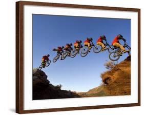 Mountain Biker Catches Air at Rampage Site near Virgin, Utah, USA-Chuck Haney-Framed Photographic Print