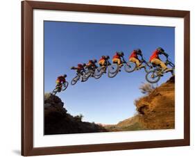 Mountain Biker Catches Air at Rampage Site near Virgin, Utah, USA-Chuck Haney-Framed Photographic Print