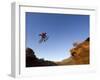 Mountain Biker Catches Air at Rampage Site near Virgin, Utah, USA-Chuck Haney-Framed Premium Photographic Print