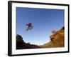 Mountain Biker Catches Air at Rampage Site near Virgin, Utah, USA-Chuck Haney-Framed Photographic Print