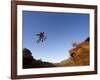 Mountain Biker Catches Air at Rampage Site near Virgin, Utah, USA-Chuck Haney-Framed Photographic Print