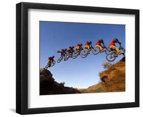 Mountain Biker Catches Air at Rampage Site near Virgin, Utah, USA-Chuck Haney-Framed Photographic Print