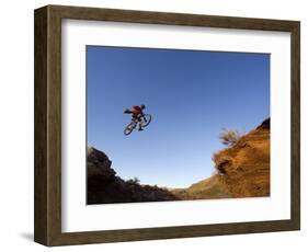 Mountain Biker Catches Air at Rampage Site near Virgin, Utah, USA-Chuck Haney-Framed Photographic Print