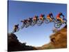 Mountain Biker Catches Air at Rampage Site near Virgin, Utah, USA-Chuck Haney-Stretched Canvas