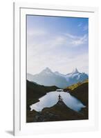 Mountain biker looking at Bachalpsee lake and Bernese Oberland mountains at dawn-Roberto Moiola-Framed Photographic Print