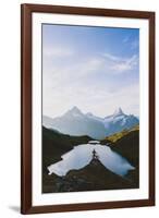 Mountain biker looking at Bachalpsee lake and Bernese Oberland mountains at dawn-Roberto Moiola-Framed Photographic Print