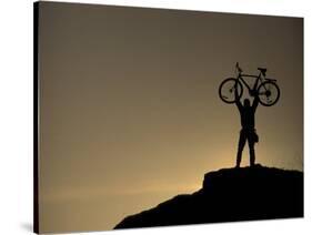 Mountain Biker on Cliffs, Turnagain Arm, Alaska, USA-Paul Souders-Stretched Canvas