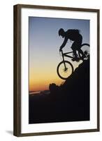 Mountain Biker Riding Down Slope-null-Framed Photo