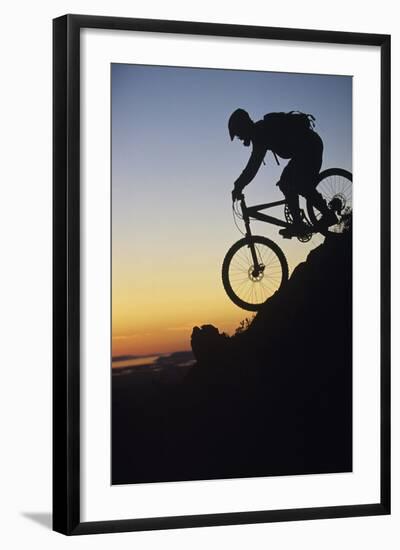 Mountain Biker Riding Down Slope-null-Framed Photo