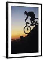 Mountain Biker Riding Down Slope-null-Framed Photo