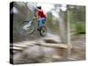 Mountain Biker Riding Stunts in Whitefish, Montana, USA-Chuck Haney-Stretched Canvas