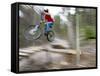 Mountain Biker Riding Stunts in Whitefish, Montana, USA-Chuck Haney-Framed Stretched Canvas