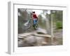 Mountain Biker Riding Stunts in Whitefish, Montana, USA-Chuck Haney-Framed Photographic Print