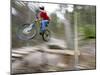 Mountain Biker Riding Stunts in Whitefish, Montana, USA-Chuck Haney-Mounted Photographic Print