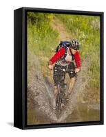 Mountain Biker Splashes Through Andrews Creek, Maah Daah Hey Trail in Medora, North Dakota, USA-Chuck Haney-Framed Stretched Canvas