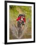 Mountain Biker Splashes Through Andrews Creek, Maah Daah Hey Trail in Medora, North Dakota, USA-Chuck Haney-Framed Photographic Print