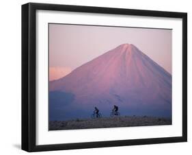 Mountain Biking in Atacama Desert Against a Backdrop of Perfect Cone of Volcan Licancabur 5916 M-John Warburton-lee-Framed Photographic Print