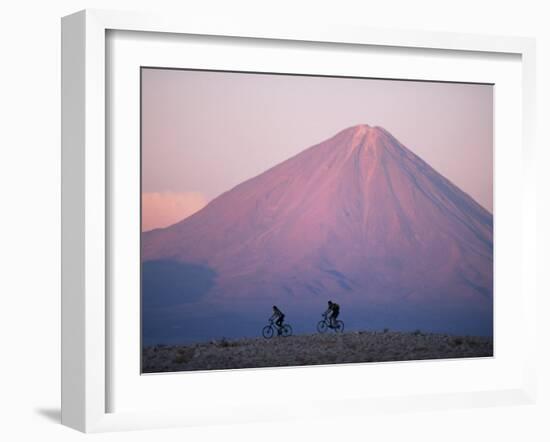Mountain Biking in Atacama Desert Against a Backdrop of Perfect Cone of Volcan Licancabur 5916 M-John Warburton-lee-Framed Photographic Print