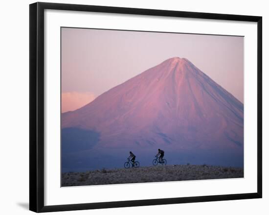 Mountain Biking in Atacama Desert Against a Backdrop of Perfect Cone of Volcan Licancabur 5916 M-John Warburton-lee-Framed Photographic Print