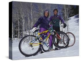 Mountain Biking on Snow-null-Stretched Canvas