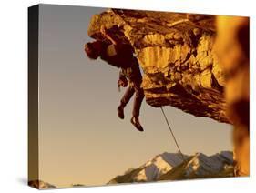 Mountain Climber Hanging from a Rock-null-Stretched Canvas