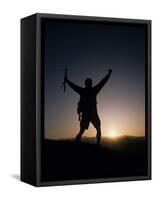 Mountain Climber Rejoices at the Summit at Sunrise-null-Framed Stretched Canvas