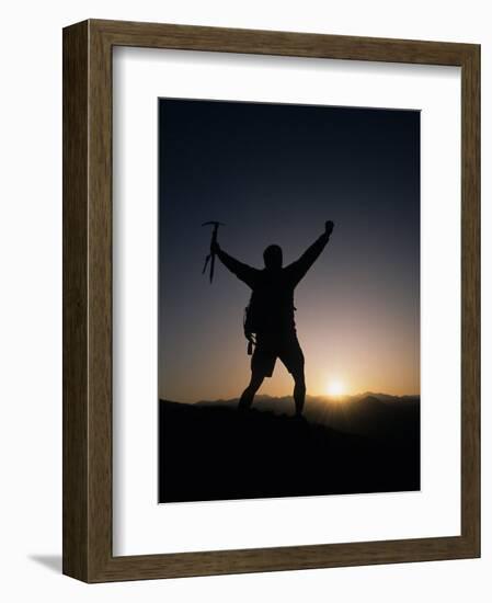 Mountain Climber Rejoices at the Summit at Sunrise-null-Framed Photographic Print
