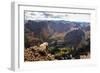 Mountain Goat Stands at the Edge of Bouldery Cliff at the Maroon Bells in Colorado-Kent Harvey-Framed Photographic Print