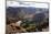 Mountain Goat Stands at the Edge of Bouldery Cliff at the Maroon Bells in Colorado-Kent Harvey-Mounted Photographic Print