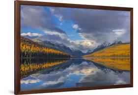 Mountain peaks reflect into Bowman Lake in autumn, Glacier National Park, Montana, USA-Chuck Haney-Framed Photographic Print