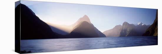 Mountain Range at Water's Edge, Milford Sound, Fiordland National Park, South Island, New Zealand-null-Stretched Canvas